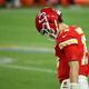 Patrick Mahomes of the Kansas City Chiefs walks with his head down in the fourth quarter against the Tampa Bay Buccaneers in Super Bowl LV at Raymond James Stadium on February 07, 2021 in Tampa, Florida.